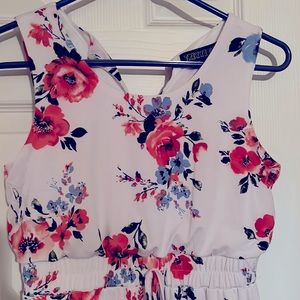 Girl white flowered dress.